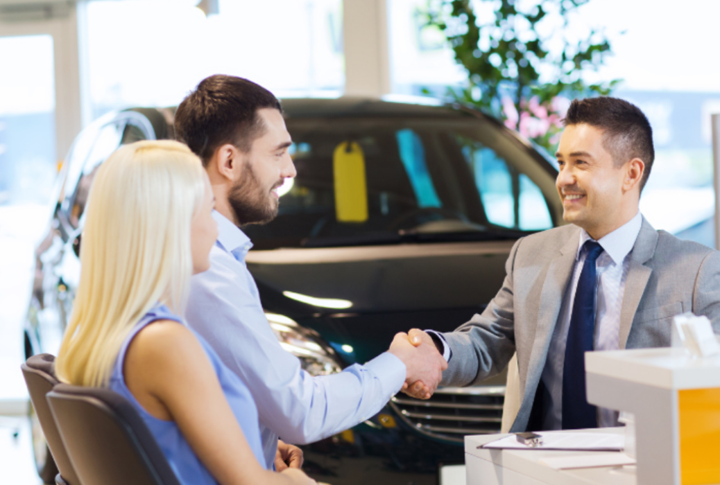 Customers talking to a salesman