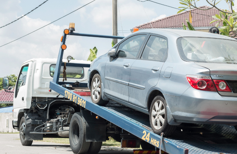 Car being towed after an accident
