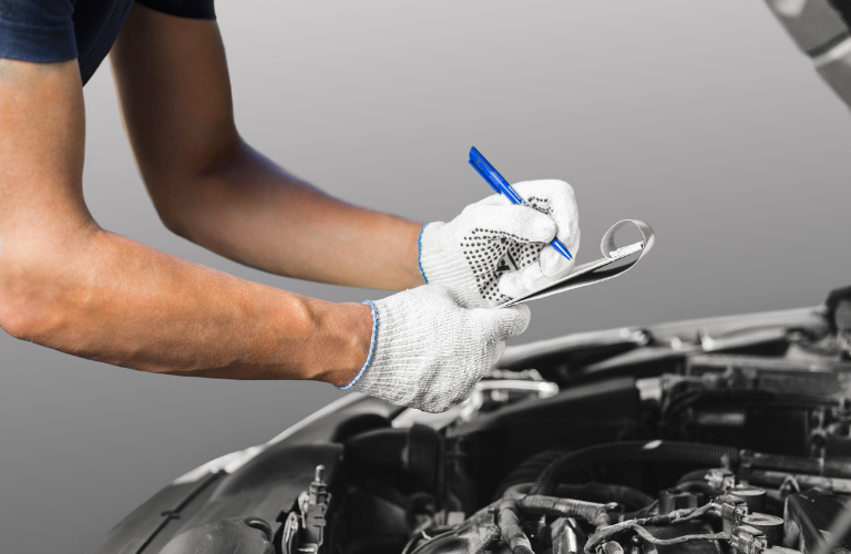 Mechanic checking a vehicle