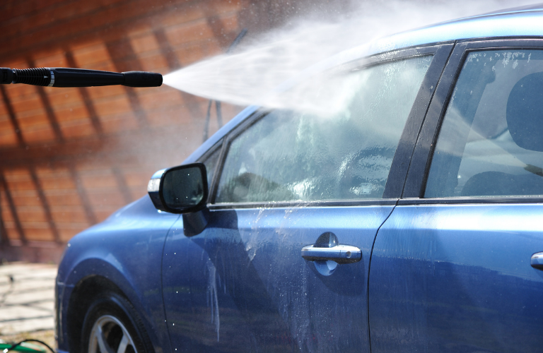 A man washing a car