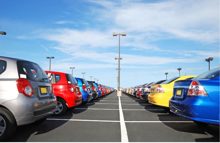 Used cars on display at a dealership