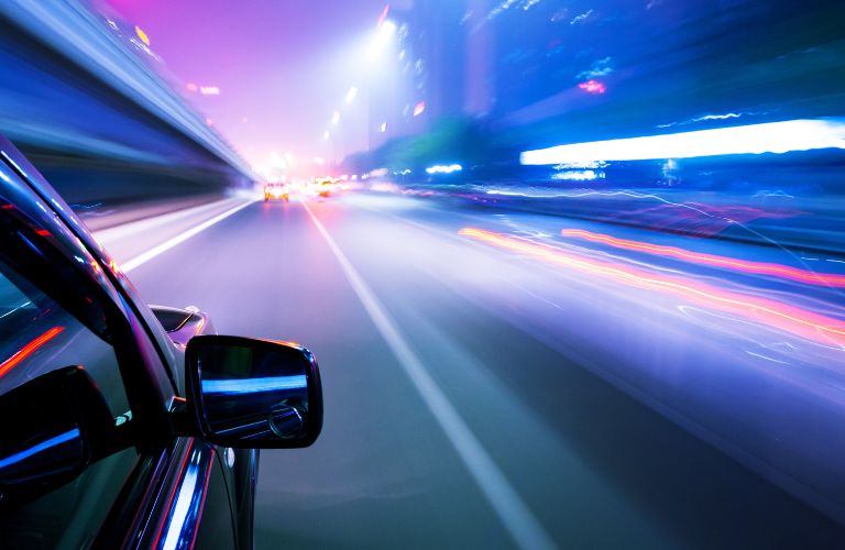 A car on the road at night